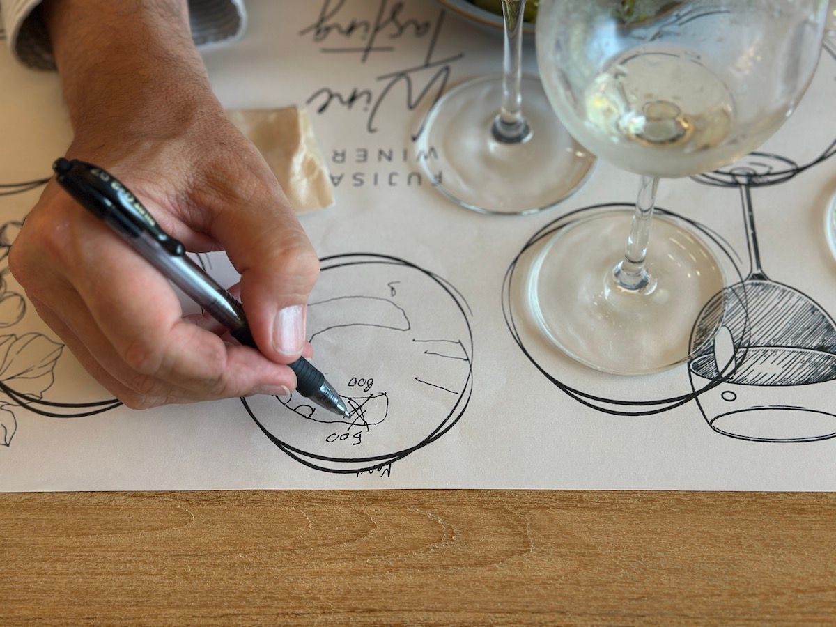  エトナの地形を説明するプラネタ氏