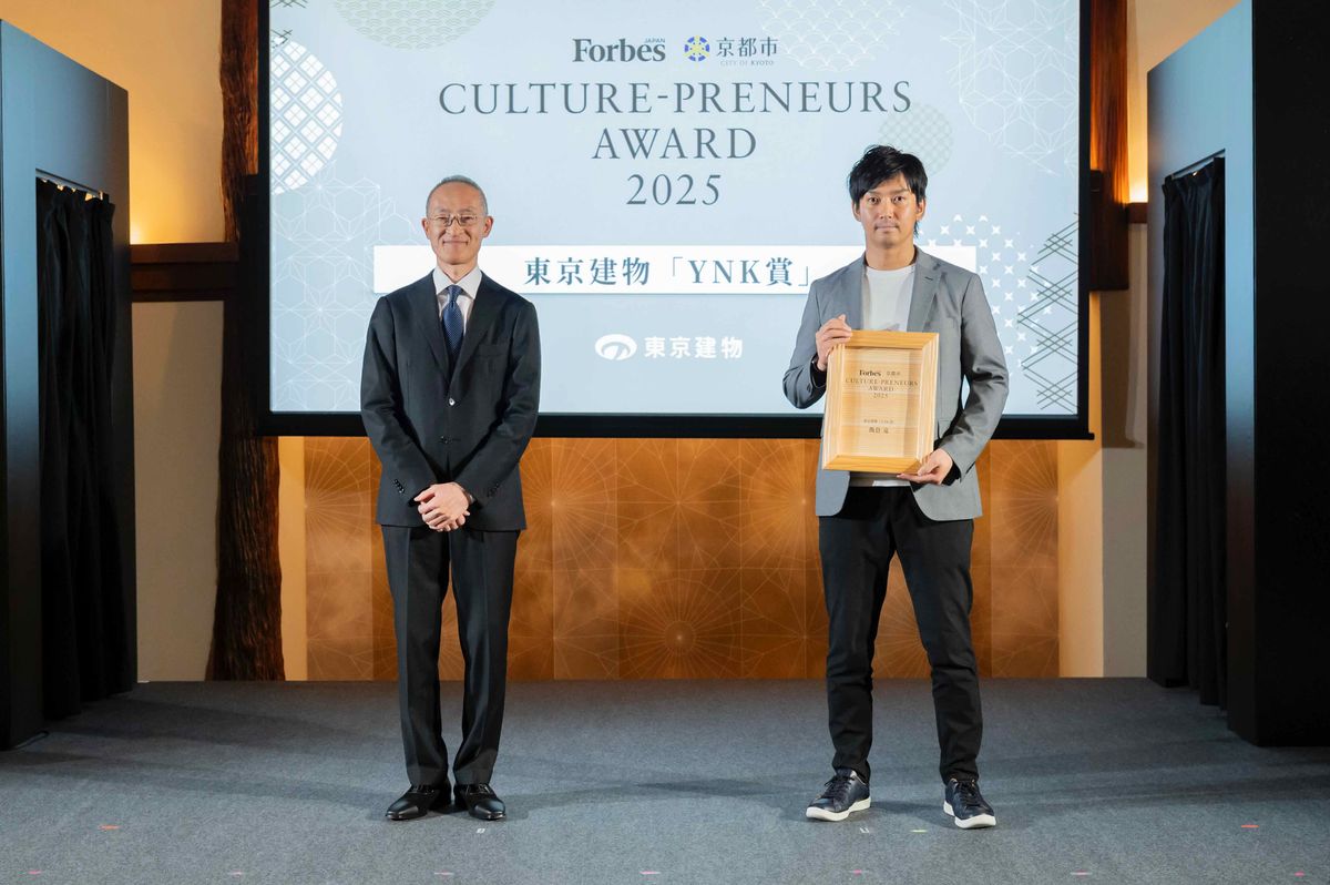 飯倉 竜（J-CAT代表取締役、右）と和泉 晃（東京建物代表取締役副社長執行役員）