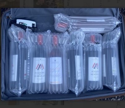 旅先で。スーツケースにルーマニアワインを詰め込んで持ち帰る（非課税）