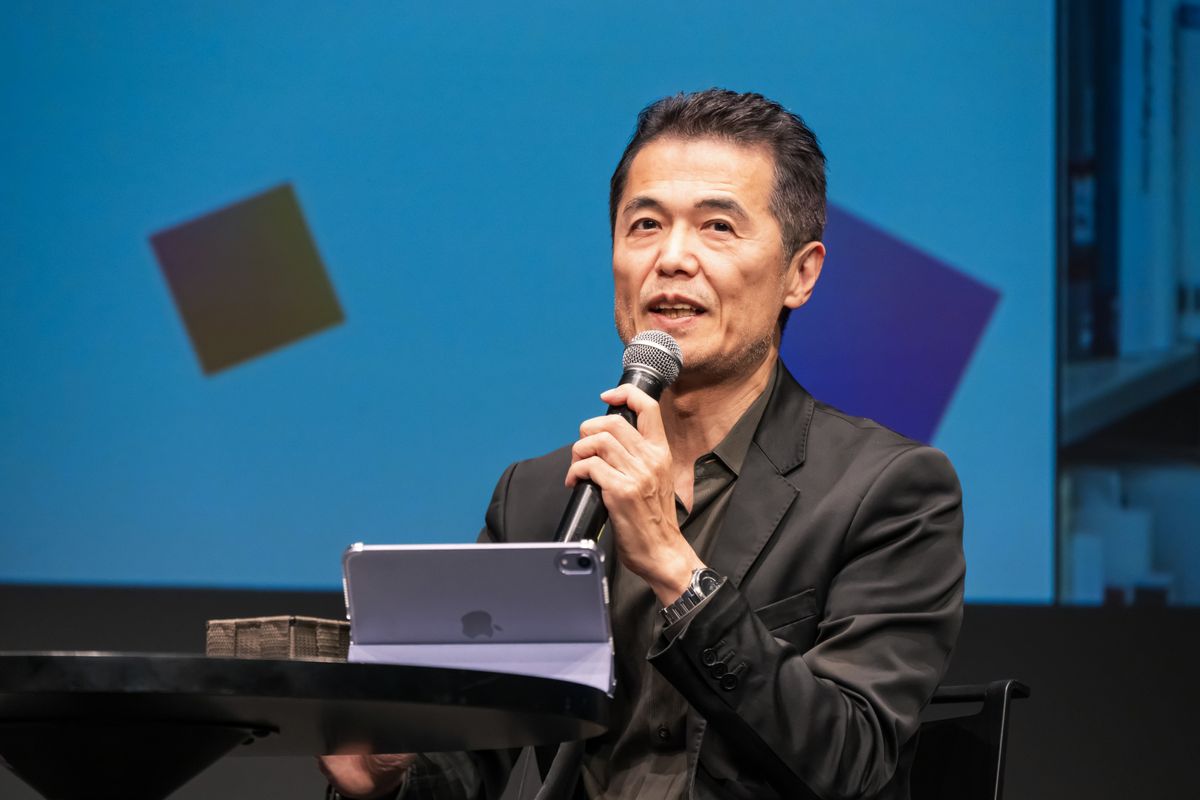 明治大学教授 山脇啓造