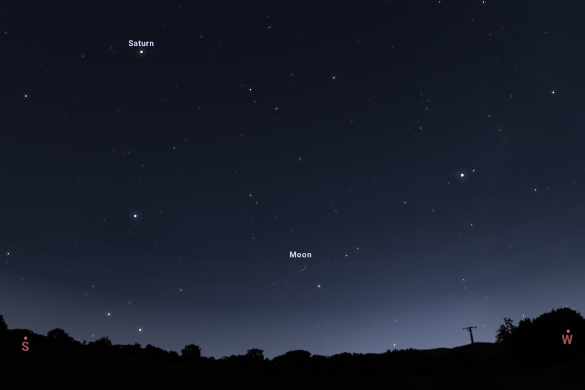 細い月とオーロラが聖夜を飾り、「惑星の王」が天を照らす クリスマス